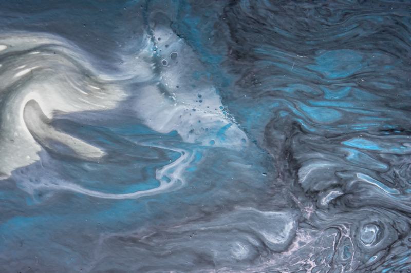 Swirled blue, silver and white pattern typical of a metallic epoxy floor